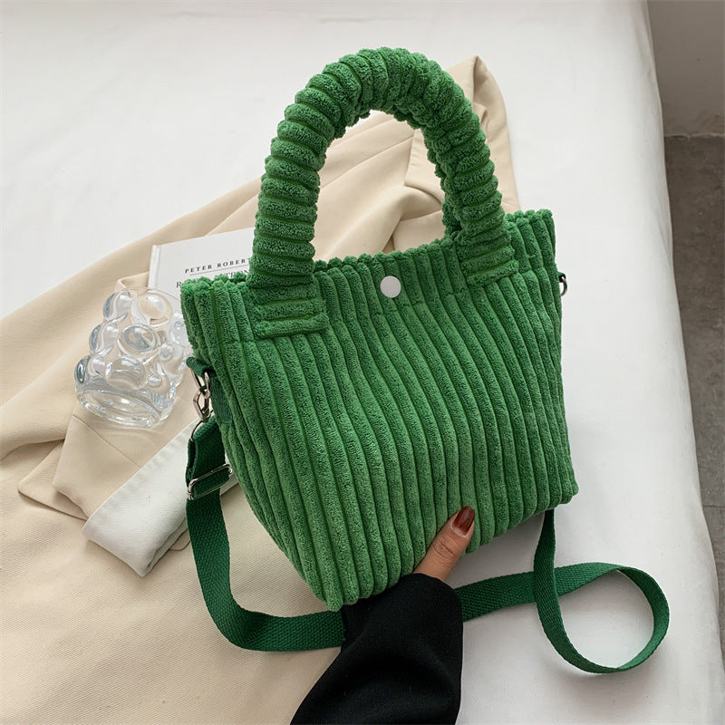 Plush shoulder bag with a slanted strap