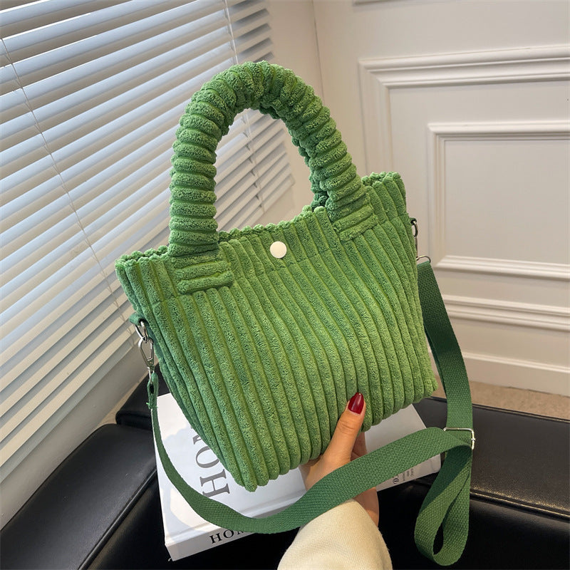 Plush shoulder bag with a slanted strap