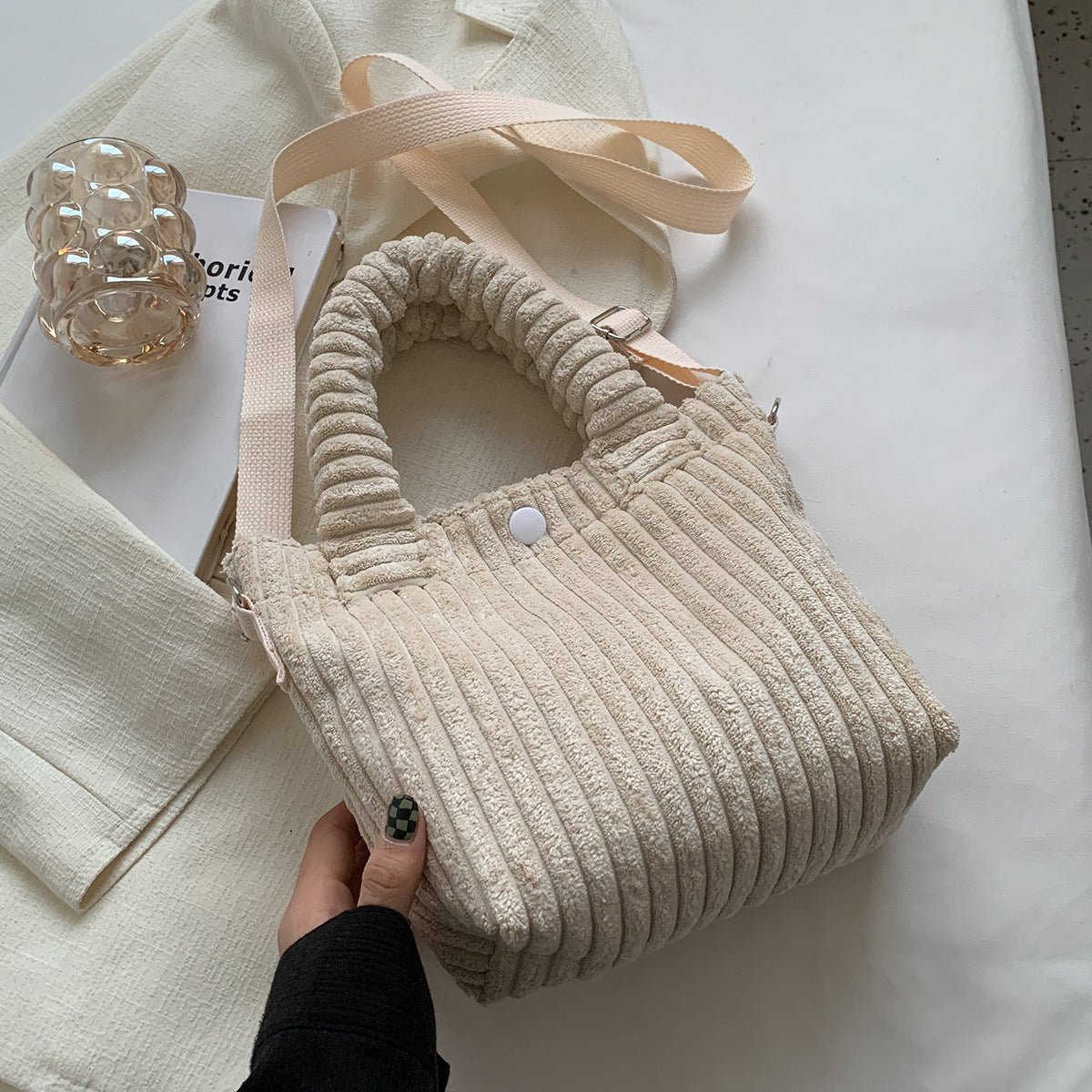 Plush shoulder bag with a slanted strap