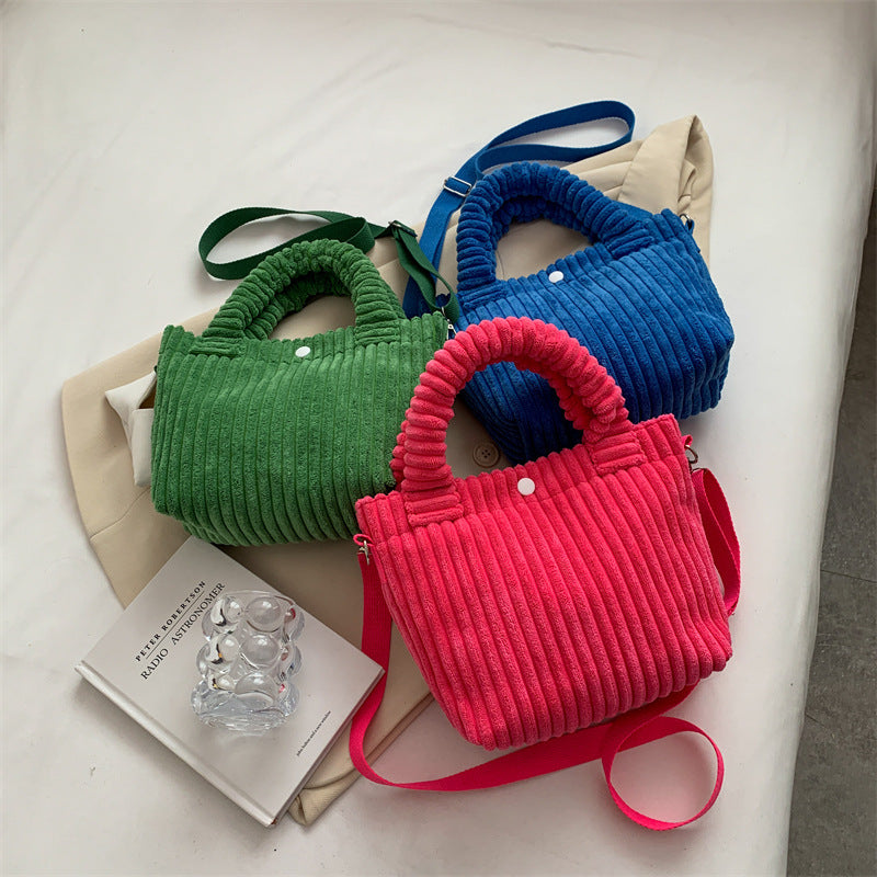 Plush shoulder bag with a slanted strap